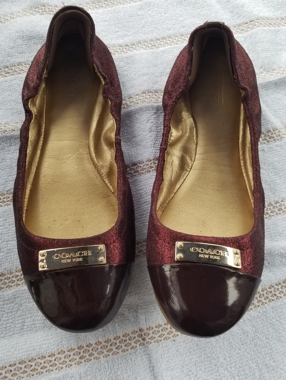 COACH Darci Women’s Burgundy Ballet Flats with Cap Toe and Gold Plaque